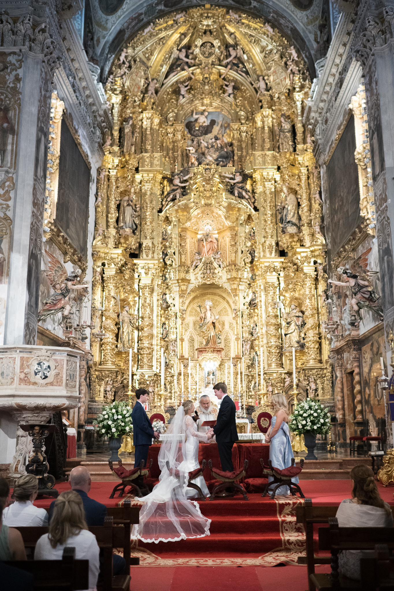 Catholic wedding ceremony at Iglesia de la Magdalena Seville Spain