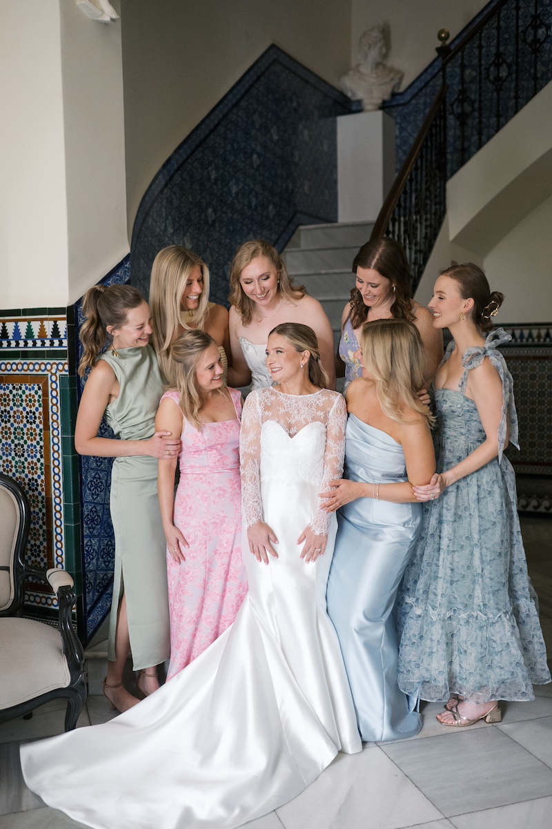 American bride with bridesmaids before an intimate destination wedding in Seville Spain